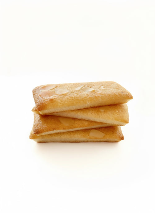 French almond financier cake, golden caramelized crust, handcrafted by French Atelier Venice FL