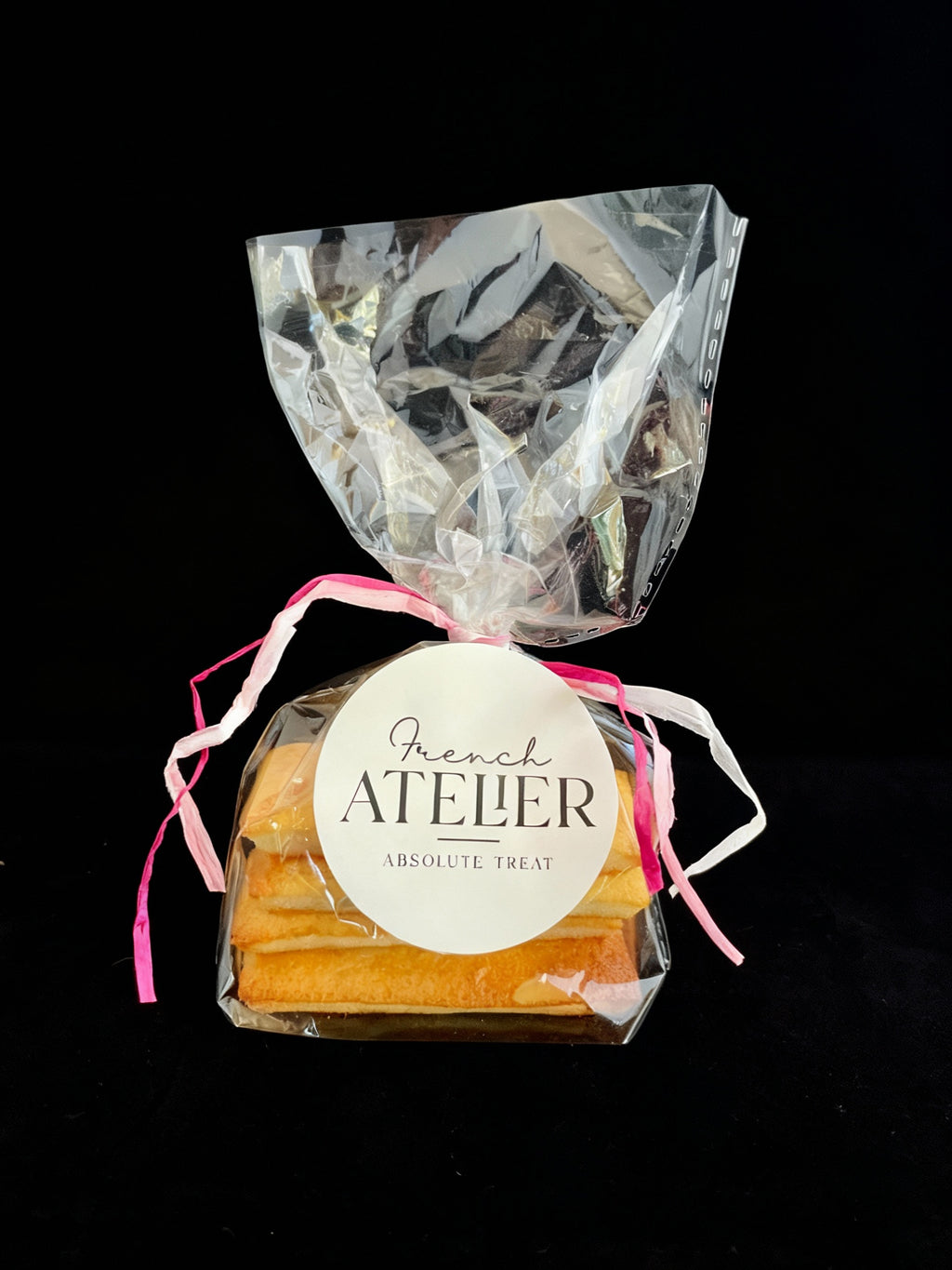 A bag of traditional French Financier almond cakes, freshly baked in Venice FL for local delivery or pickup on Farmers market.