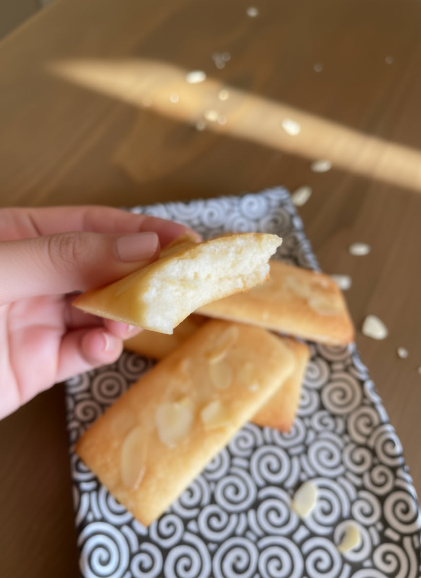 A bag of traditional French Financier almond cakes, freshly baked in Venice FL for local delivery or pickup on Farmers market.