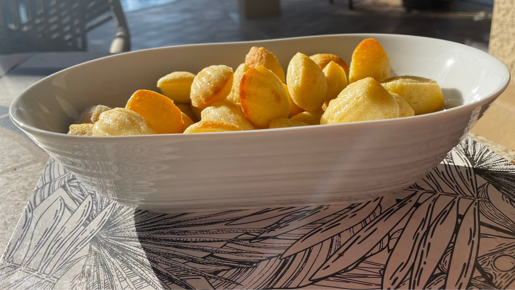 Bowl of petite vanilla bean madeleines from a French bakery, the French Atelier in Venice Florida.