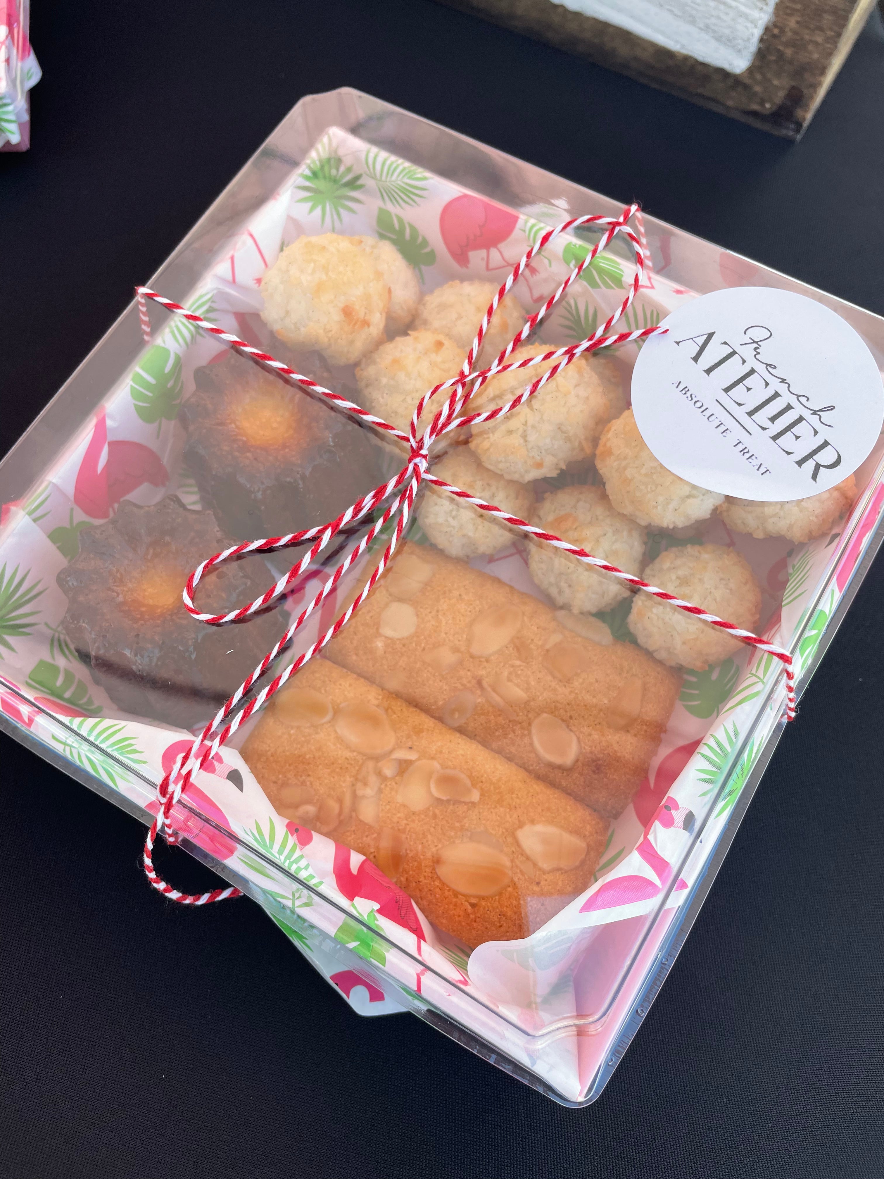 Gourmet platter with canelé (rum cake with Siesta key rum), coconut macaroons and financiers (Almond cake) from the French Atelier, french bakery in Venice Sarasota florida