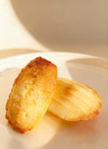 Traditional French Madeleines with lemon and poppy seeds, artisanal pastry from French Atelier Venice.