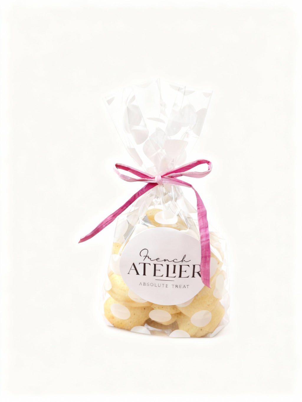 Bag of petite vanilla bean madeleines from a French bakery, the French Atelier in Venice Florida.