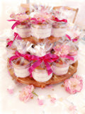 Parisian mini treats in an elegant pink gift tin for baby shower girl celebrations, handcrafted by French Atelier, a French bakery in Venice, florida.